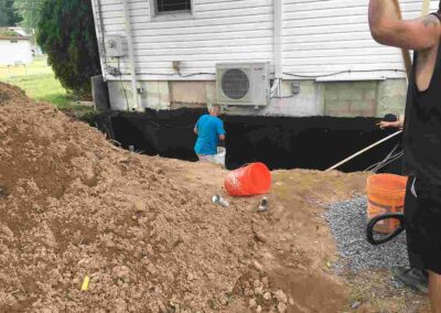 Building foundation wall and exterior waterproofing in Pasadena and Severna Park, MD.
